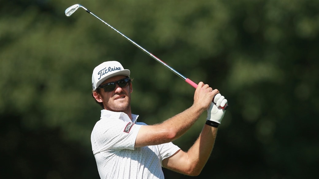 Lanto Grifin hits an approach shot with a Titleist 718 AP2 iron during action at the 2019 Robert Trent Jones Golf Trail Championship